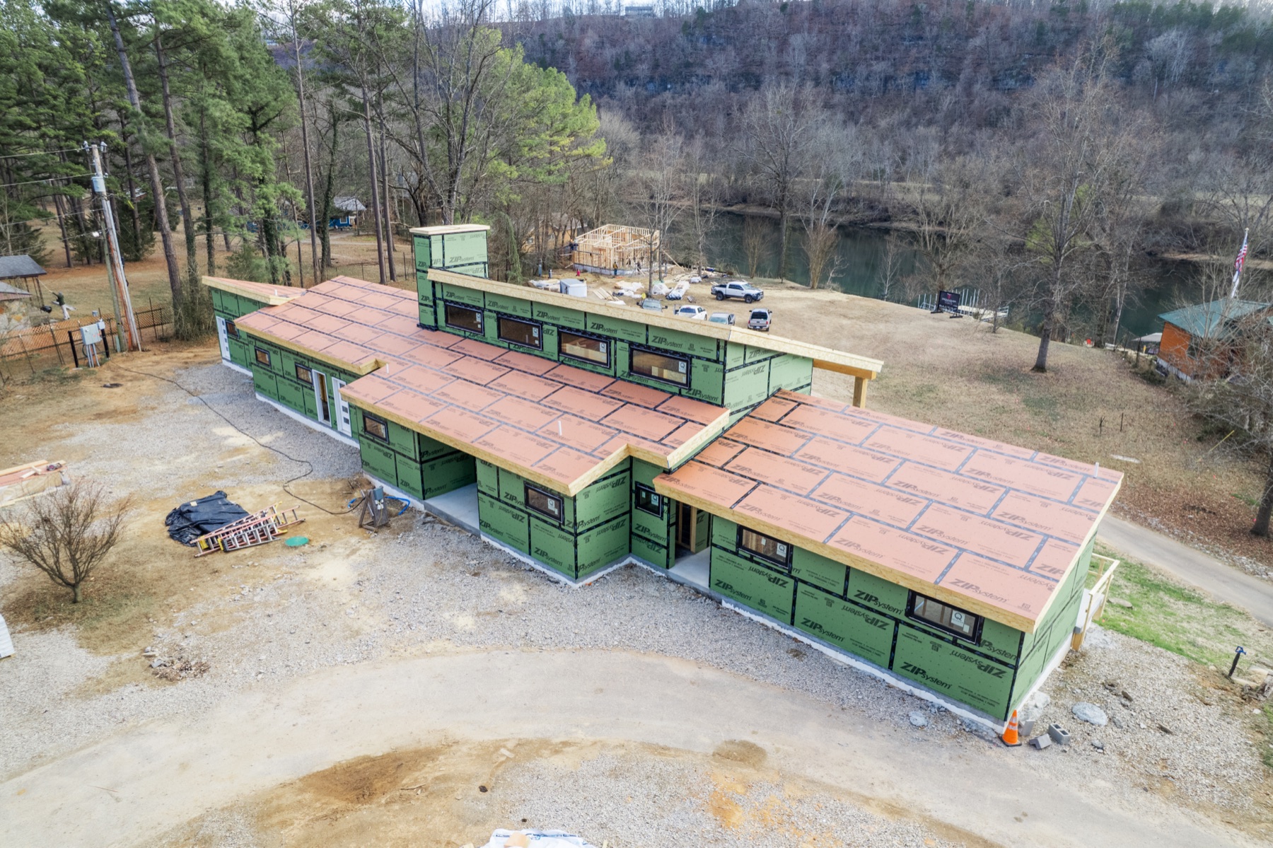 Aerial view of a custom riverfront home under construction in Mountain Home